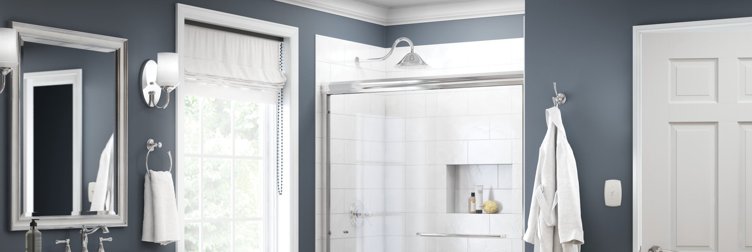 Bathroom interior with shower, mirror, and towels.