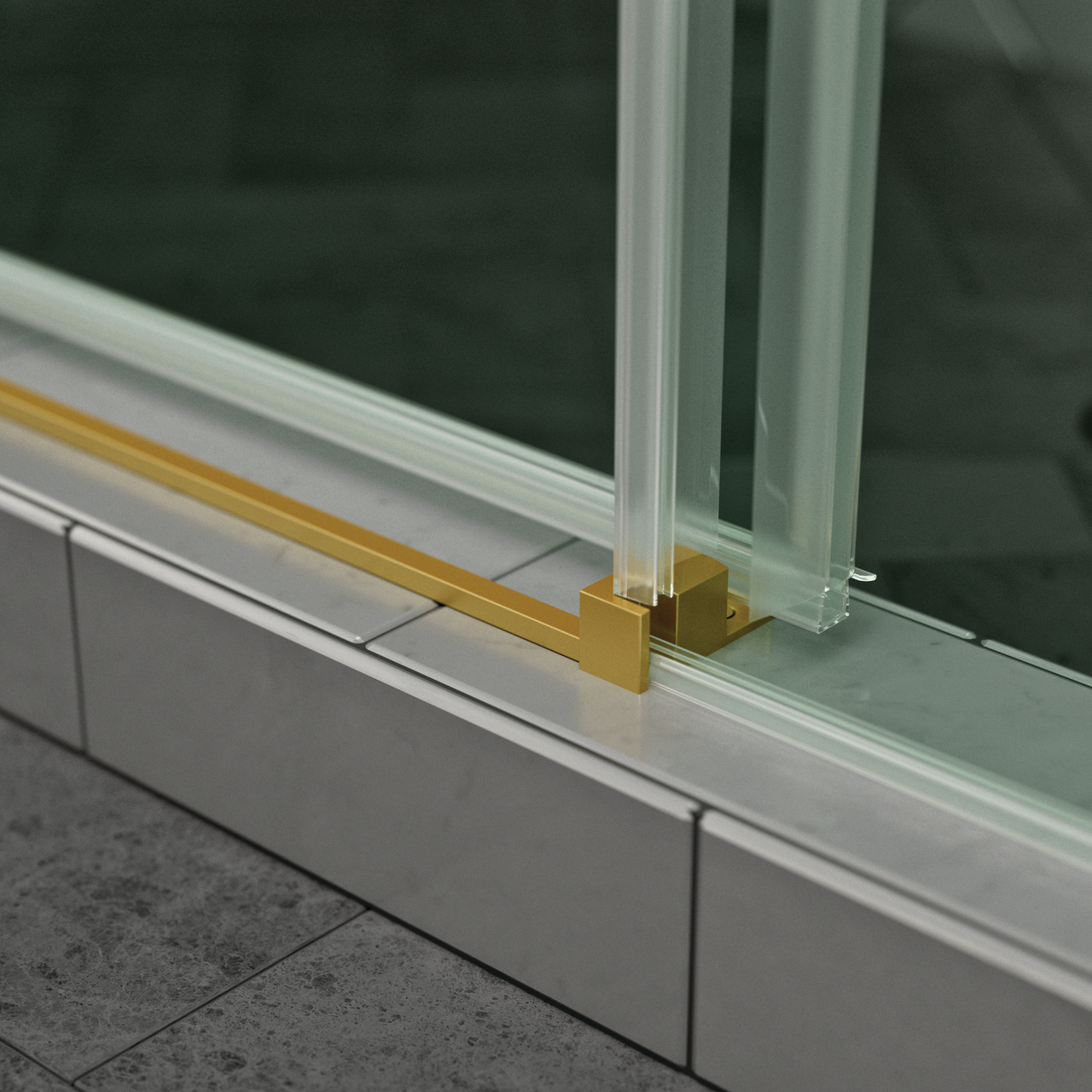Close up of Commix Shower Door bottom track in Matte Gold
