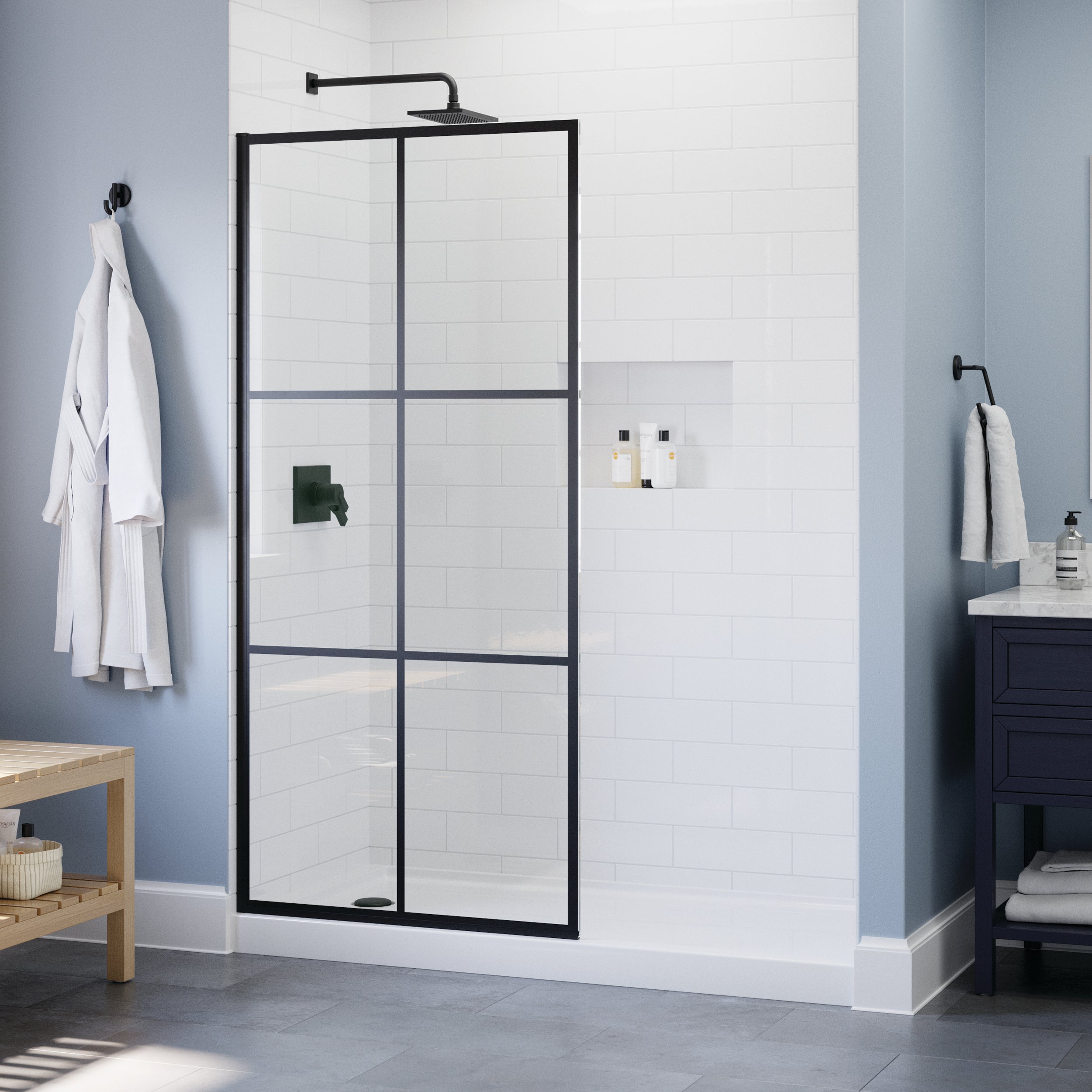 Bathroom with a black framed shower screen, white tiles, and a wooden bench.