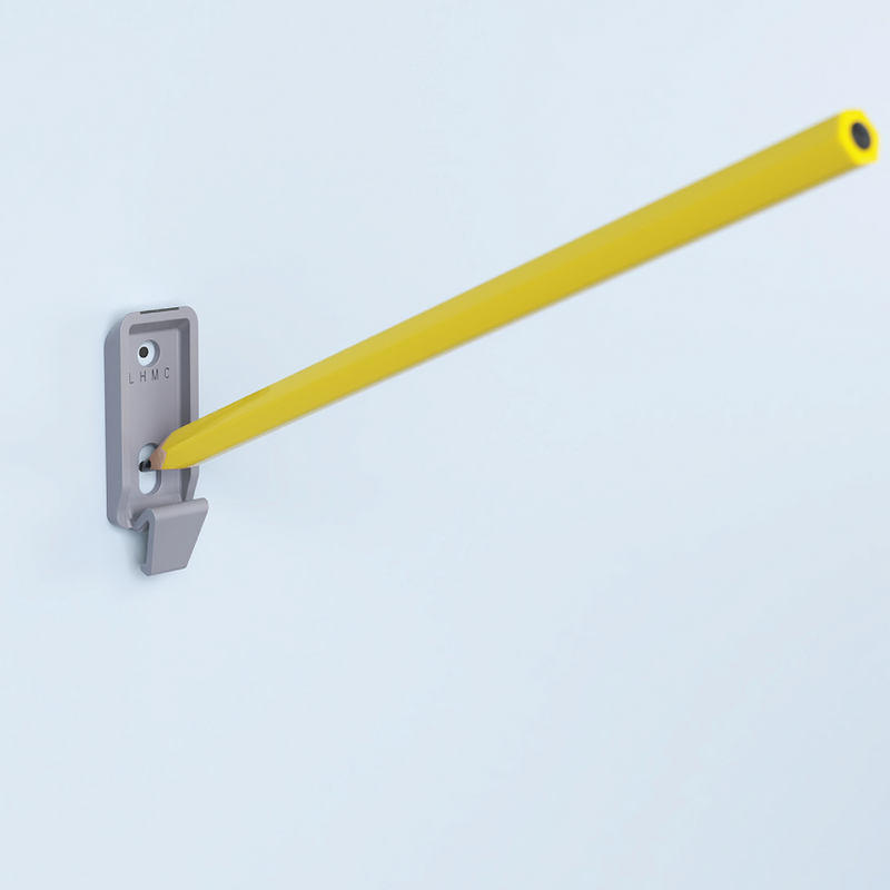 Yellow pencilwith a metal bracket on a light blue background